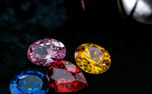 How are gemstones valued and graded?