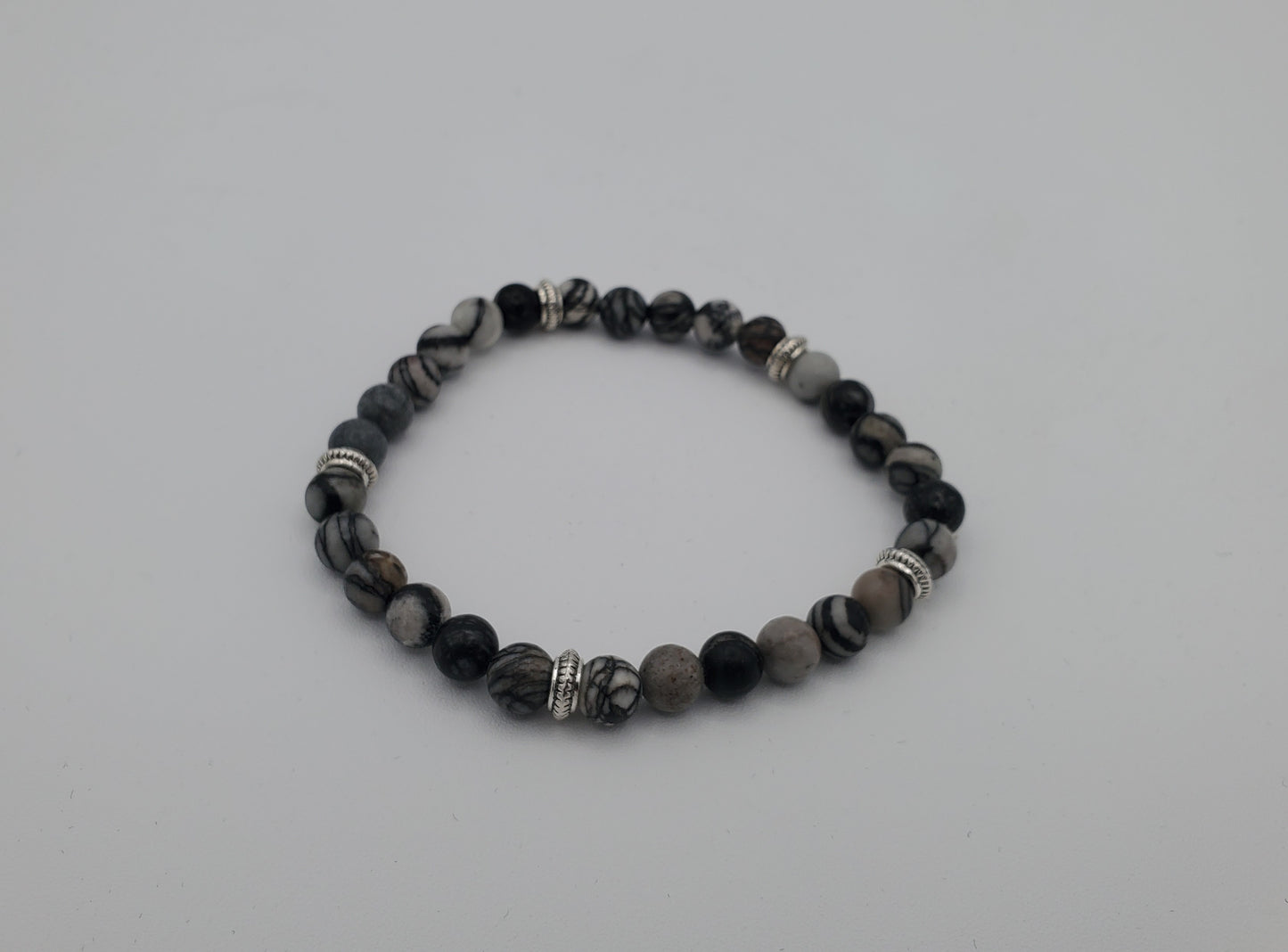 Explore the Fascination of Elegance in the Dark Grey Hematite Bracelet